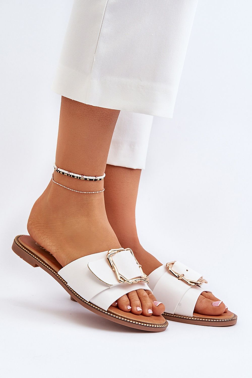 Clacquettes Step in style