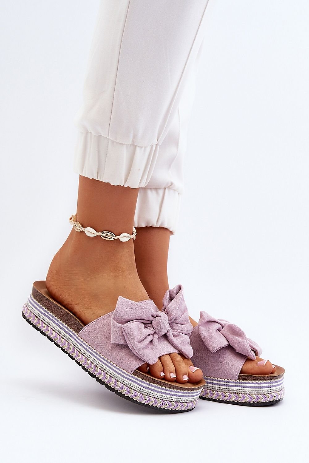Clacquettes Step in style
