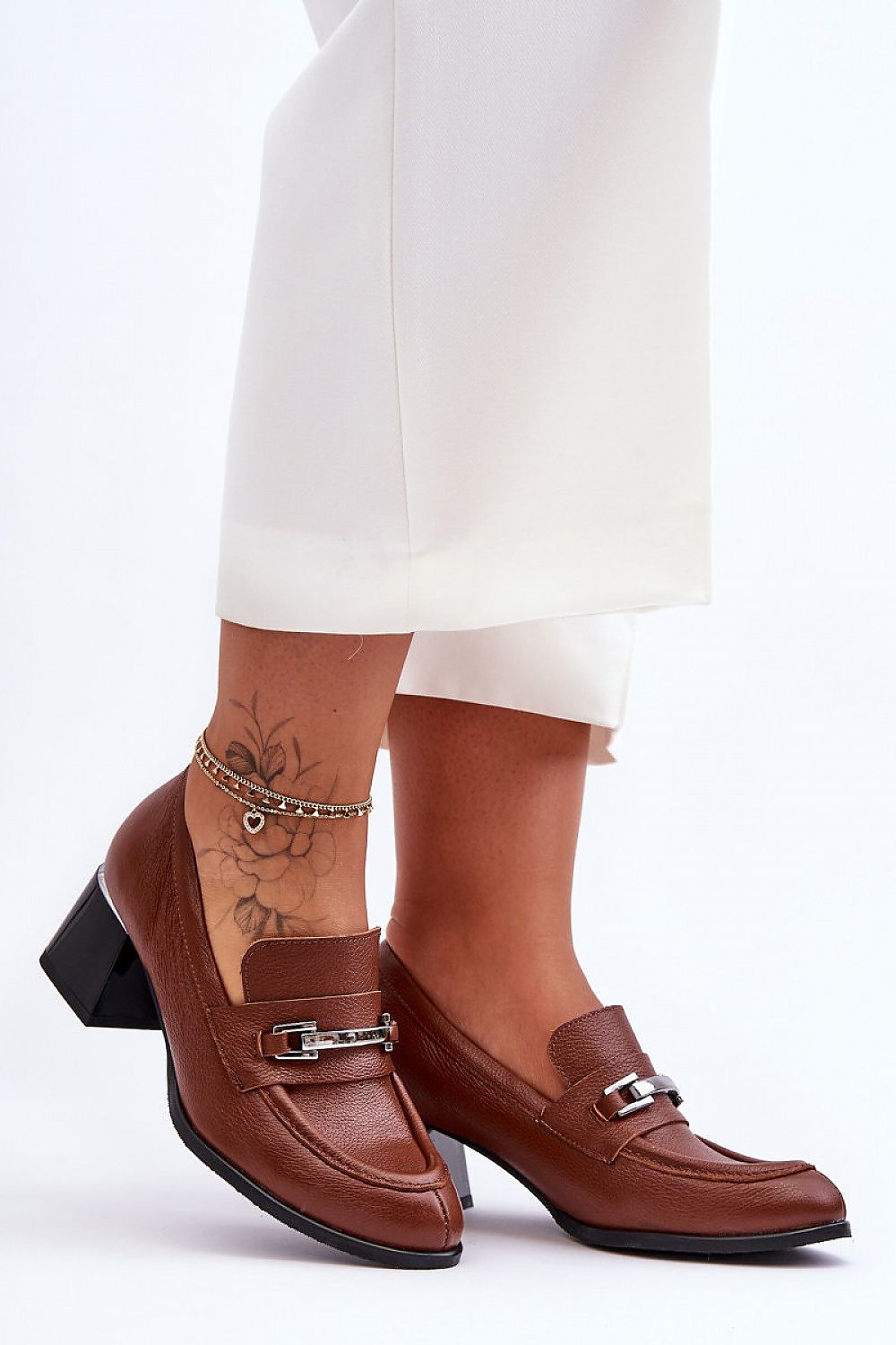 Step in style model 184007 heeled pumps