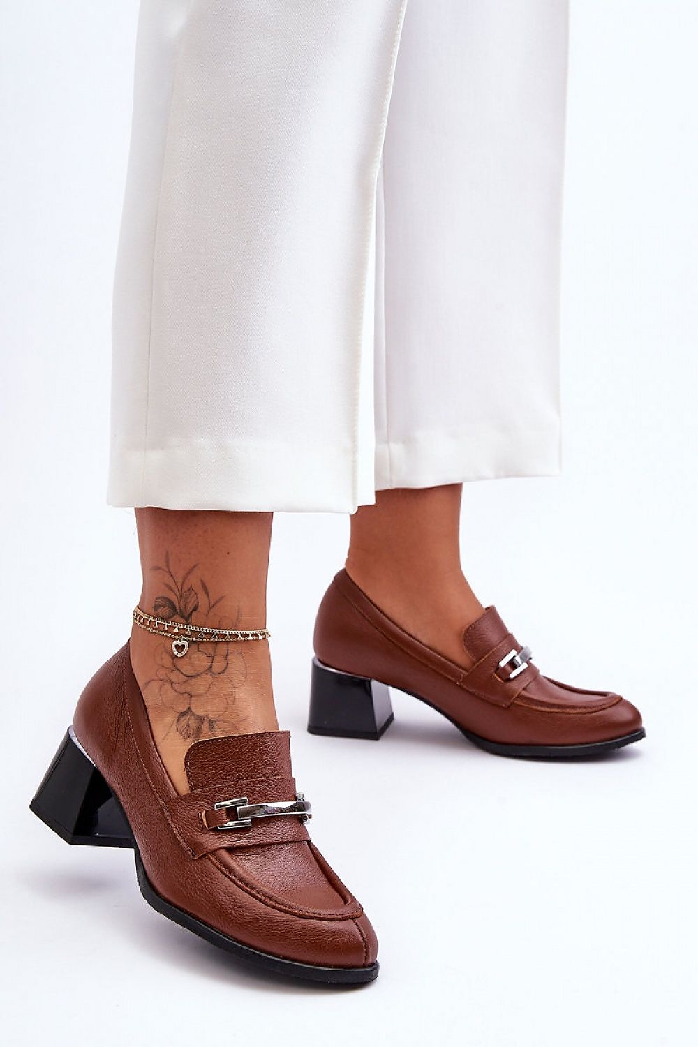 Step in style model 184007 heeled pumps