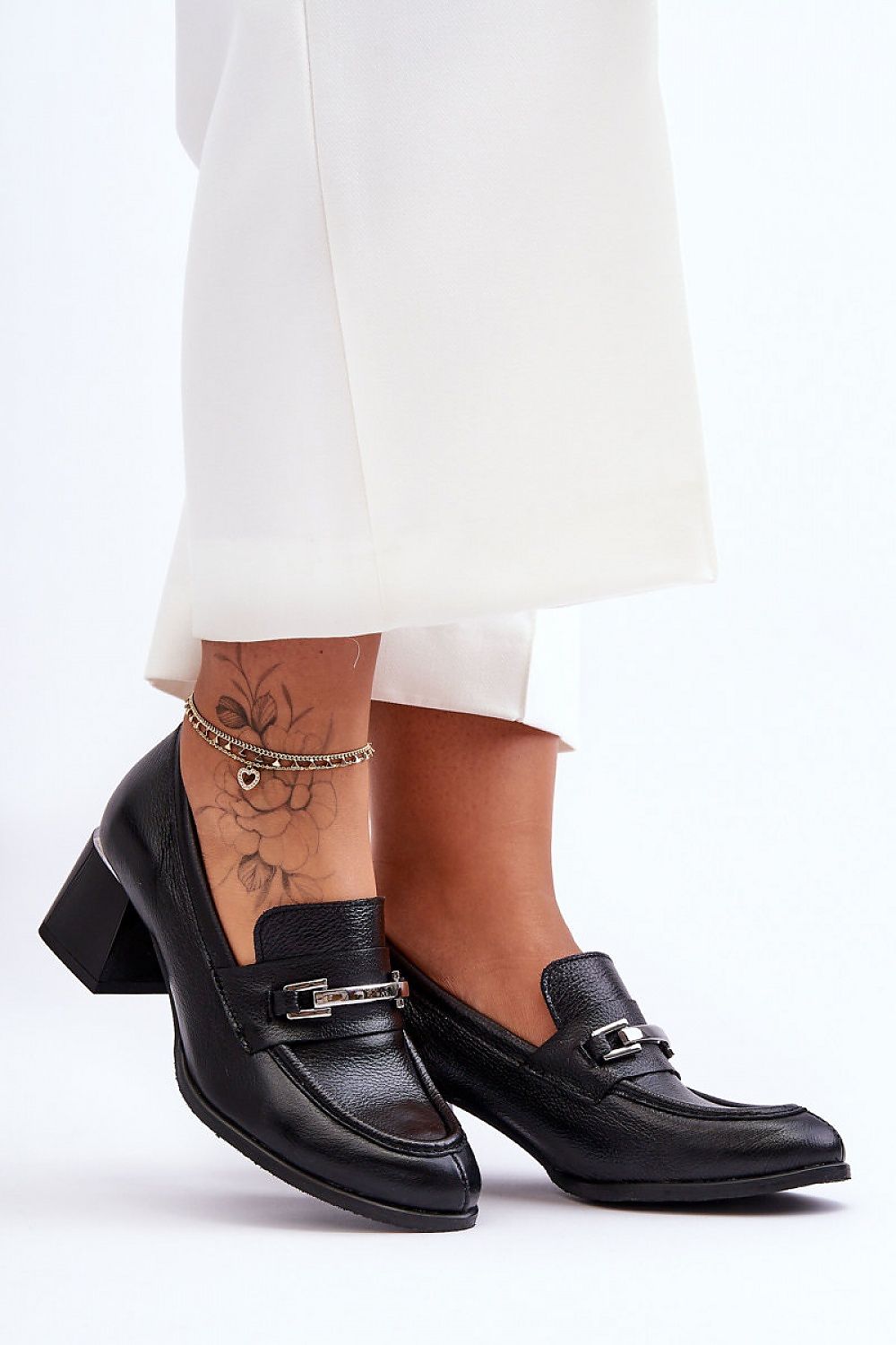 Step in style model 184007 heeled pumps