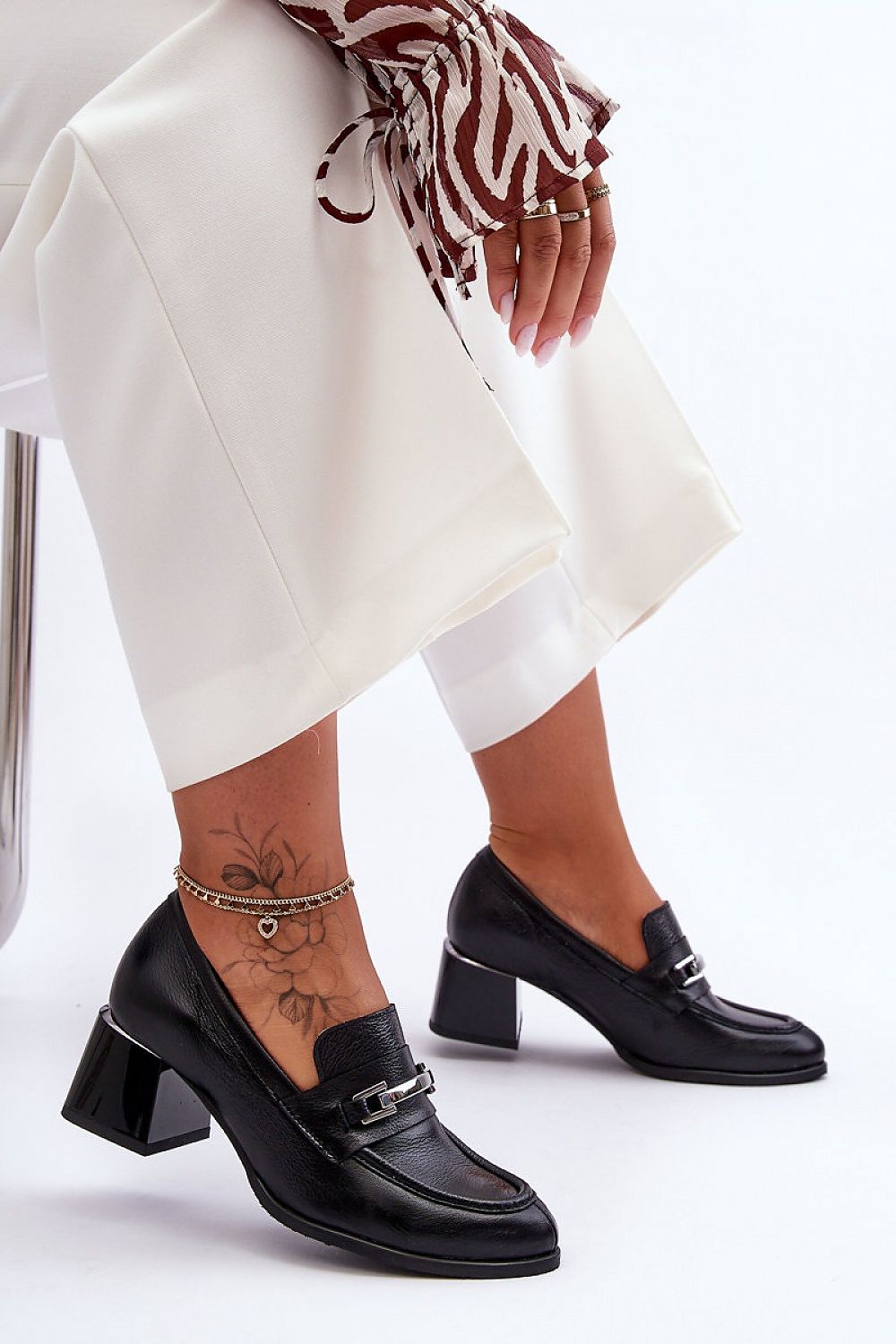 Step in style model 184007 heeled pumps