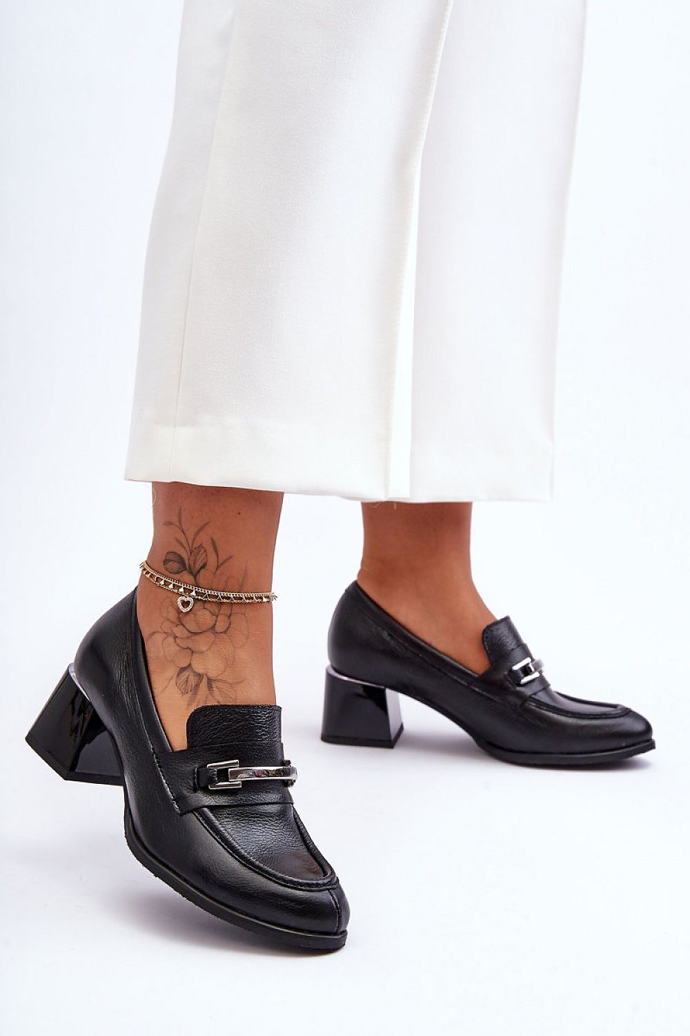 Step in style model 184007 heeled pumps
