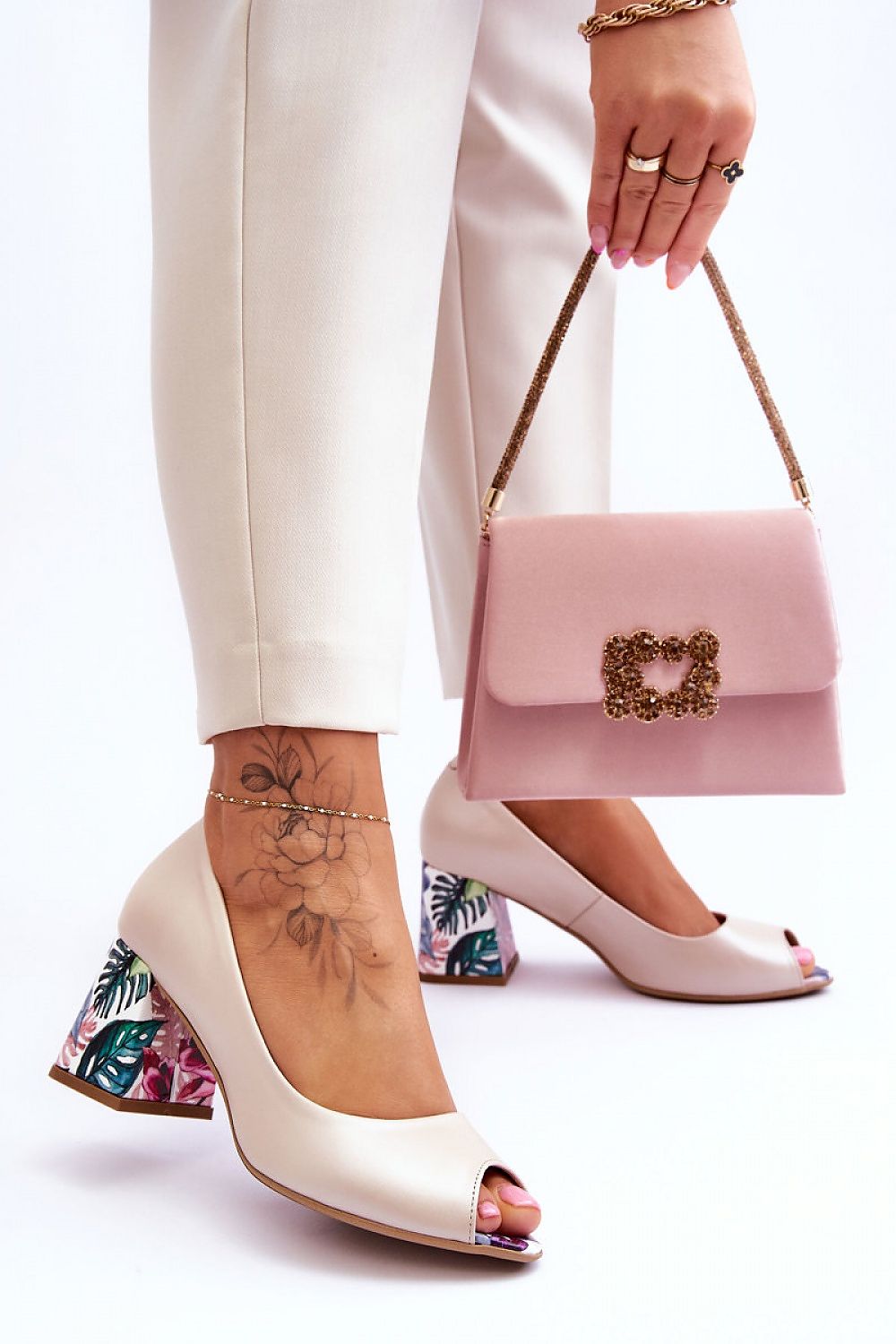 Step in style model 177701 heeled pumps