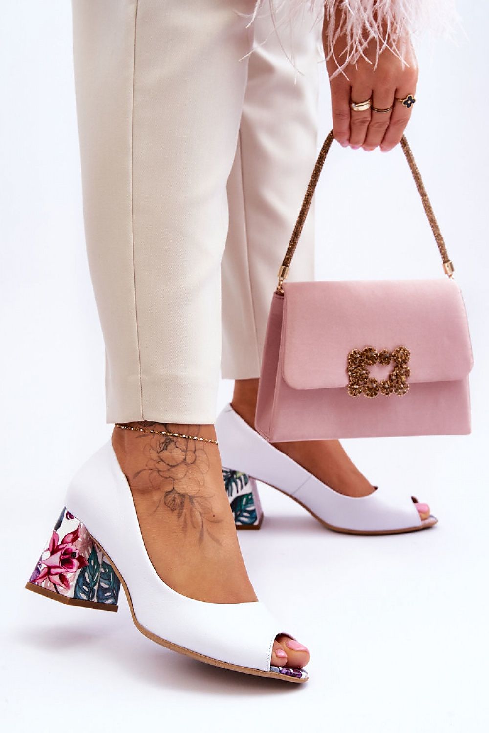 Step in style model 177701 heeled pumps